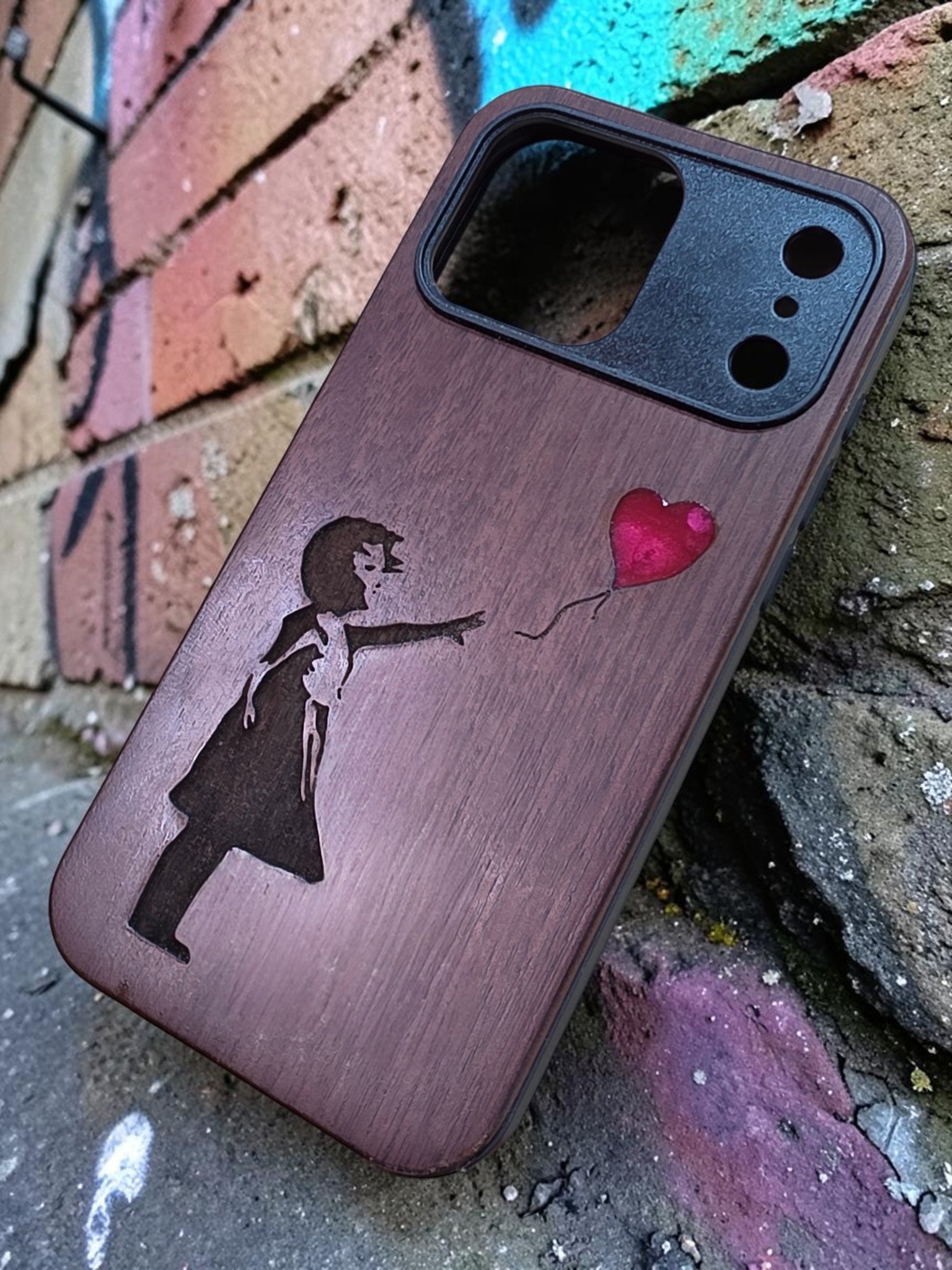 Heart Balloon Girl Walnut Veneer Phone Case with Red Resin Inlay – iPhone 17 Pro & 17 Pro Max