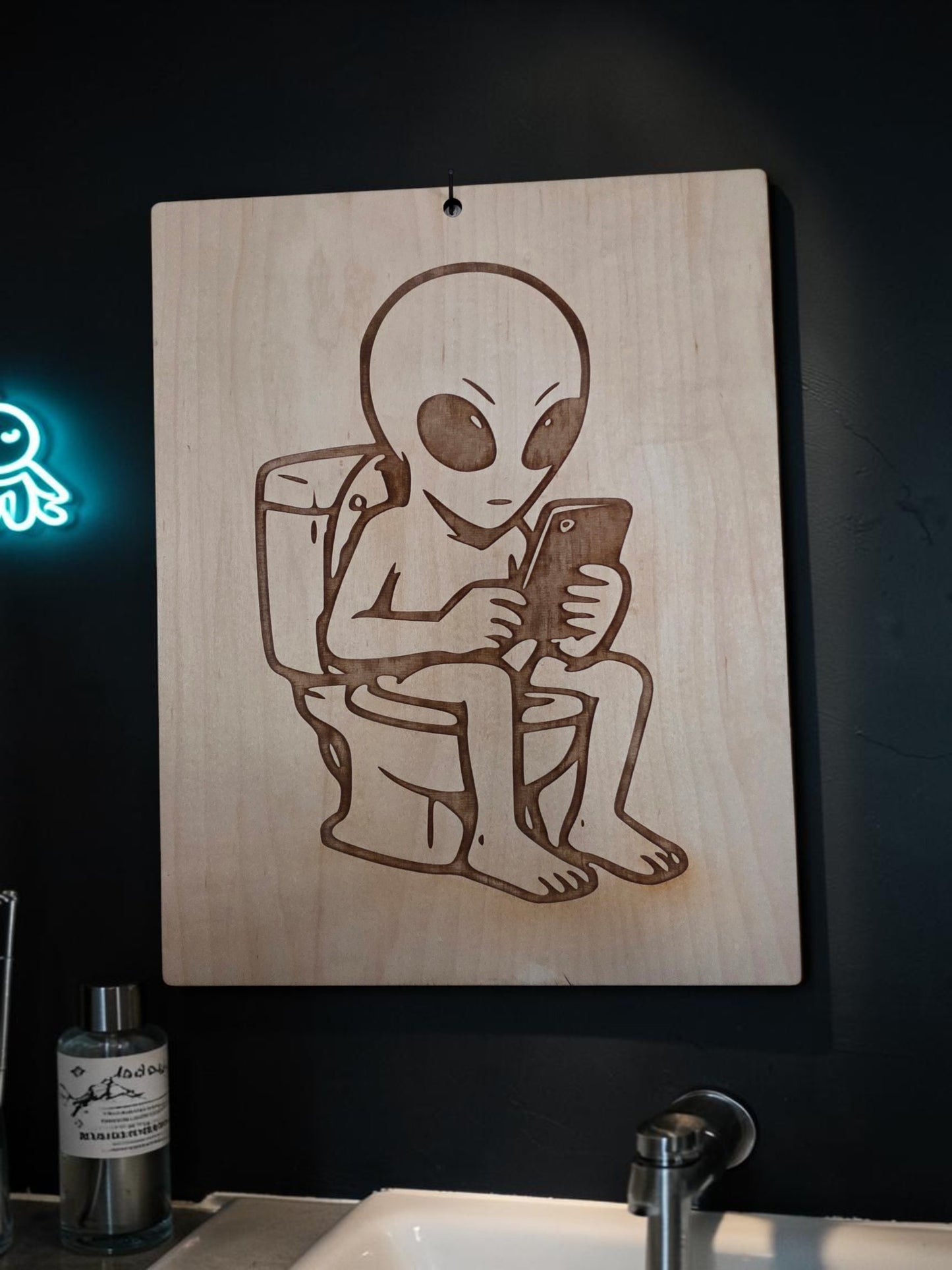 Alien on the Toilet – 11" x 17" Engraved Maple Bathroom Wall Art